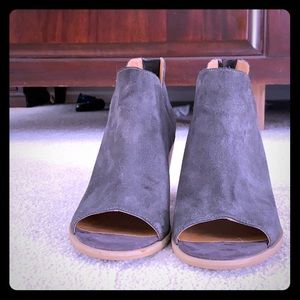 Peep toe suede bootie.